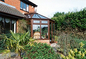 DAC PVCu Woodgrain Conservatory