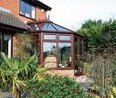 PVCu Woodgrain Victorian style conservatory